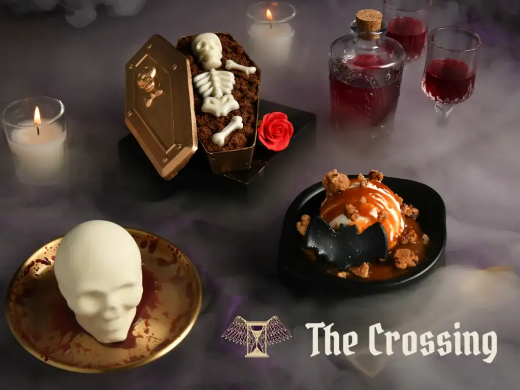 The Crossing Halloween dessert experience in Winter Park: skull pastry, warm pumpkin cake, and chocolate coffin dessert.